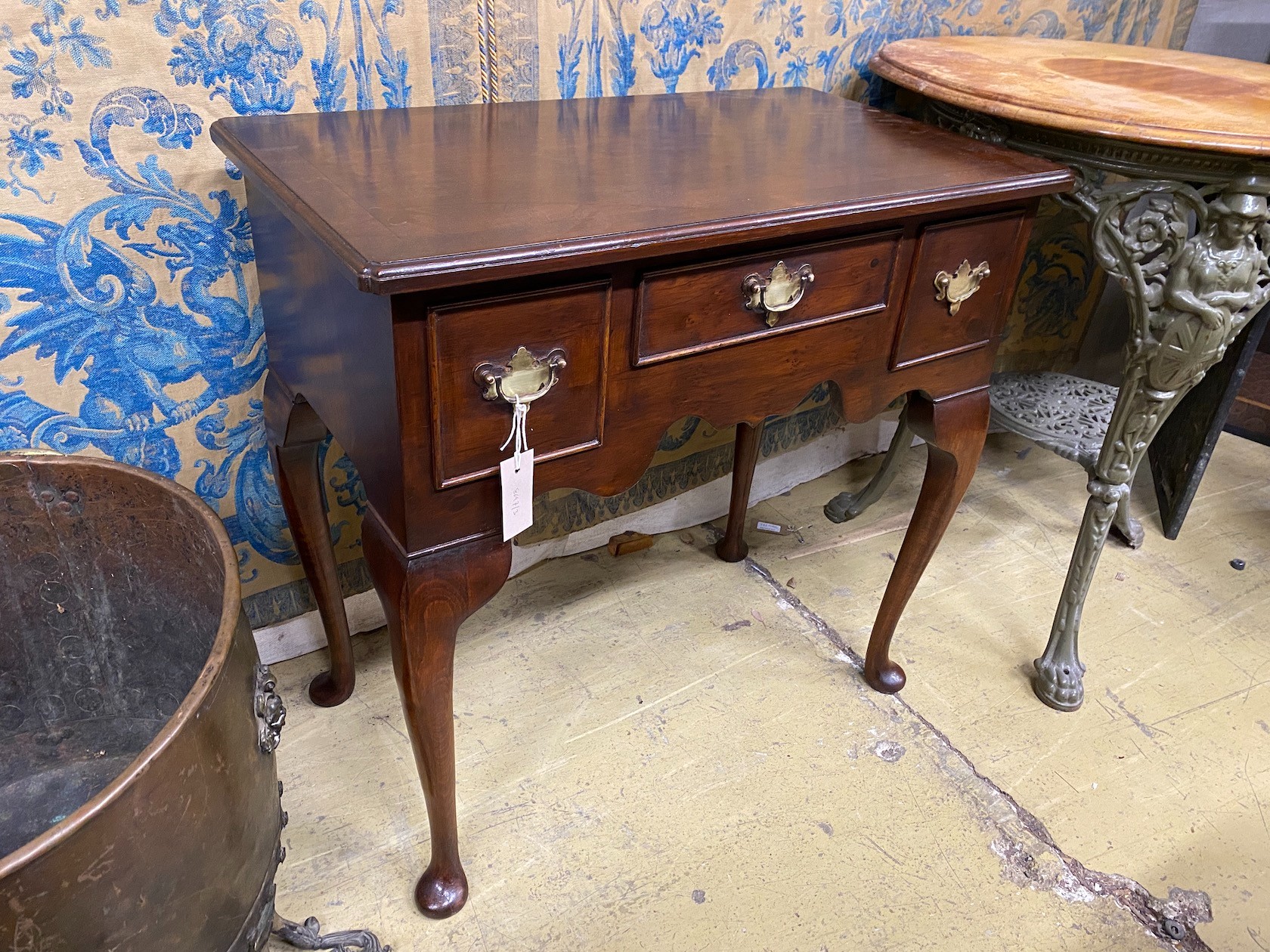 A reproduction George III style mahogany lowboy, width 72cm, depth 42cm, height 75cm